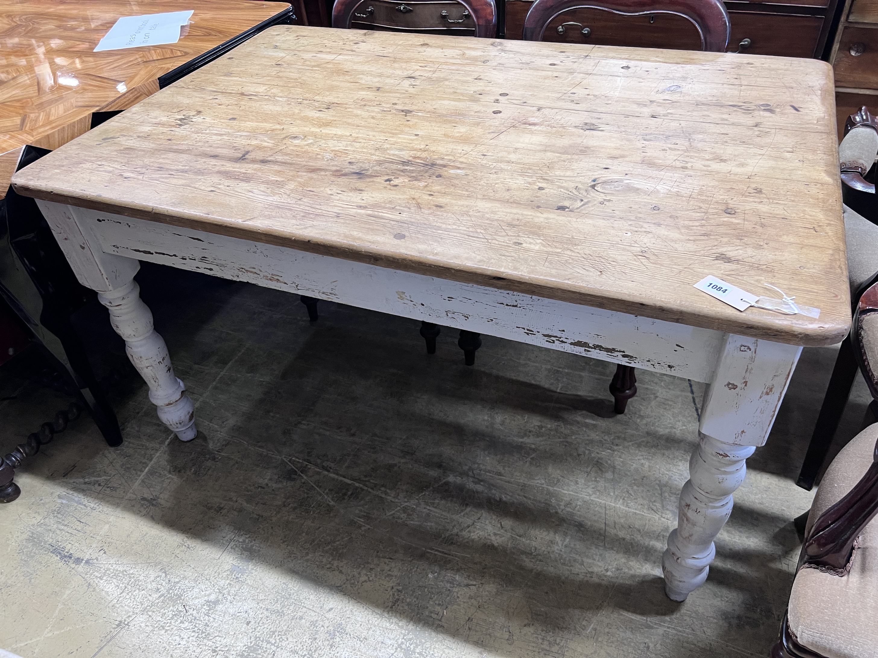 A Victorian style pine kitchen table with painted underframe, width 137cm, height 92cm